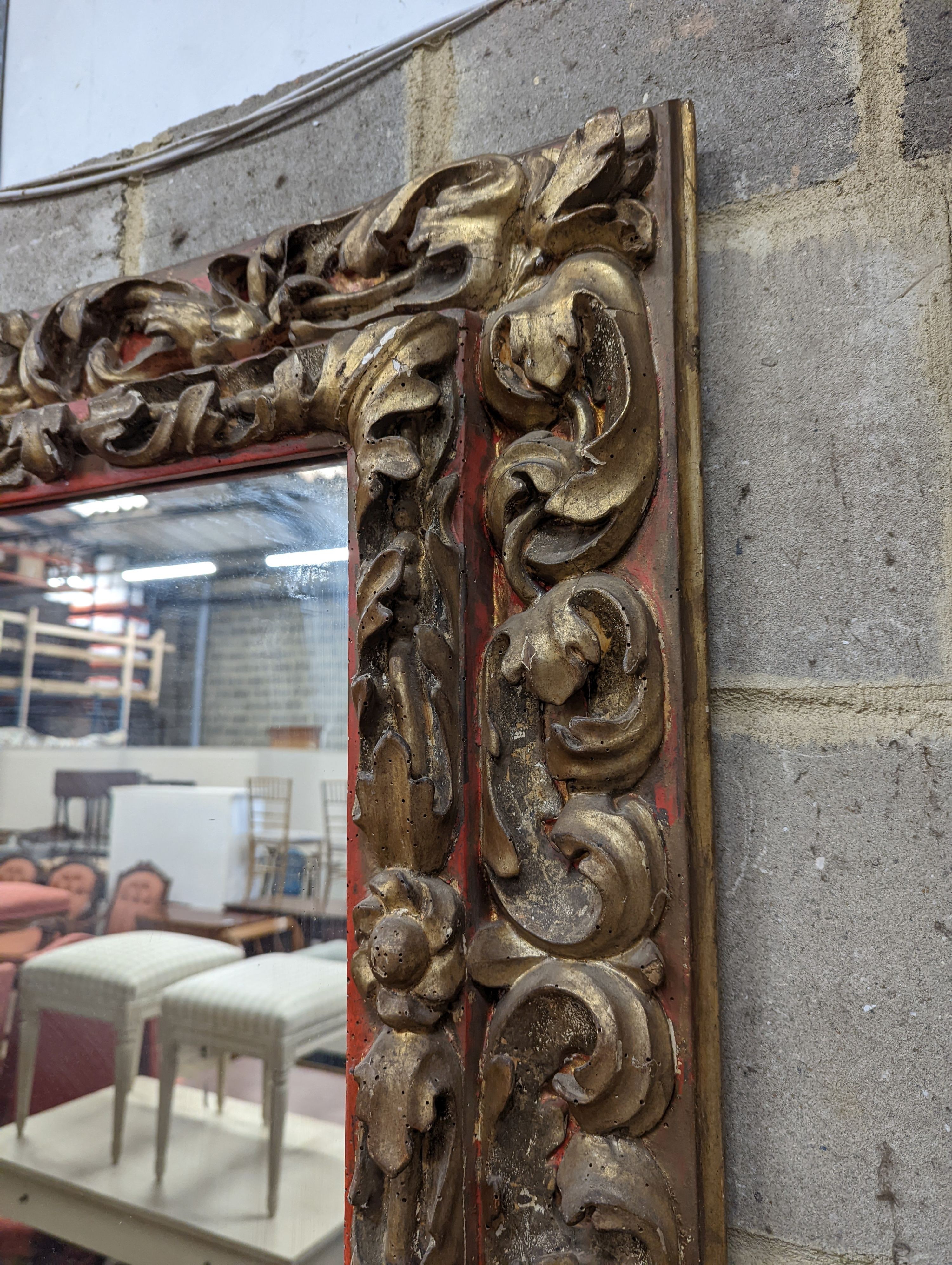 A 19th century carved giltwood rectangular wall mirror, width 140cm, height 76cm